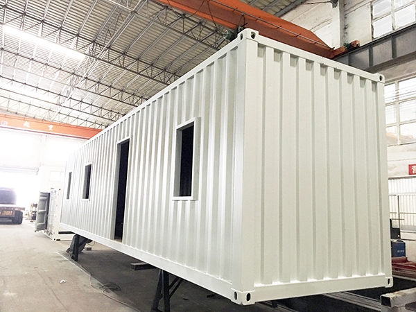 A Smooth Rolling off the Production Line of the 40 feet Housing Container Structure